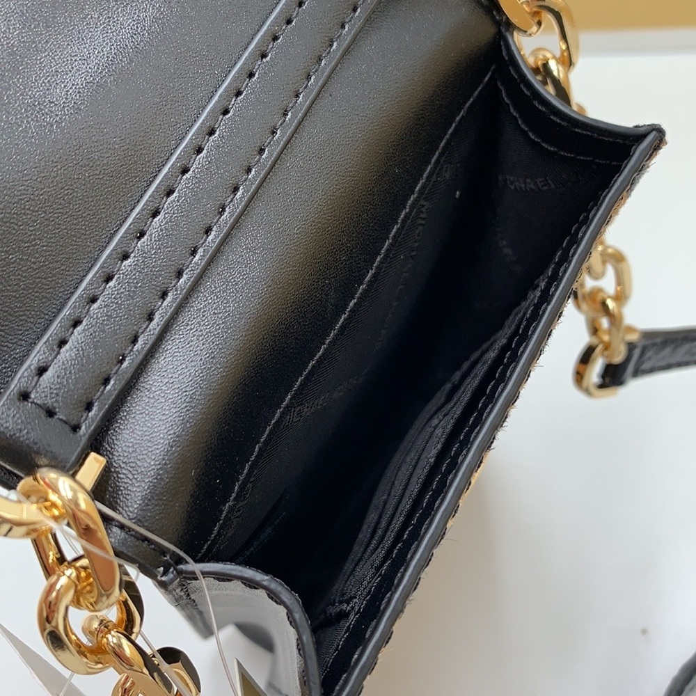 Brand New with Tag
Michael Kors Carmen Small NS Phone XBODY HairCalf
Black Multi - Picture 9 of 16